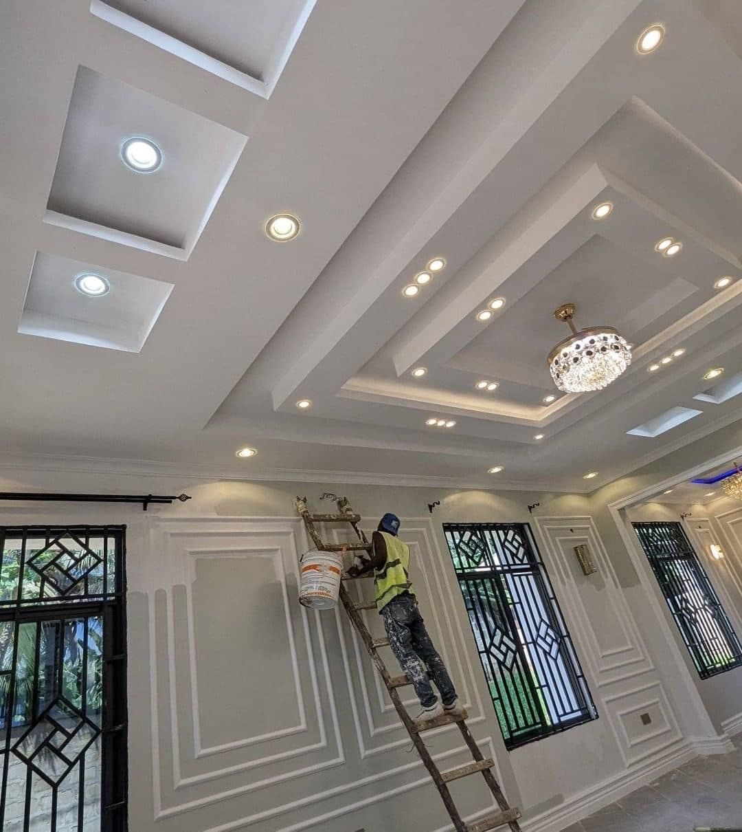 Layered tray ceiling with recessed spotlighting, ready for decoration - bespoke joinery by Royalwoods Interiors, Nairobi